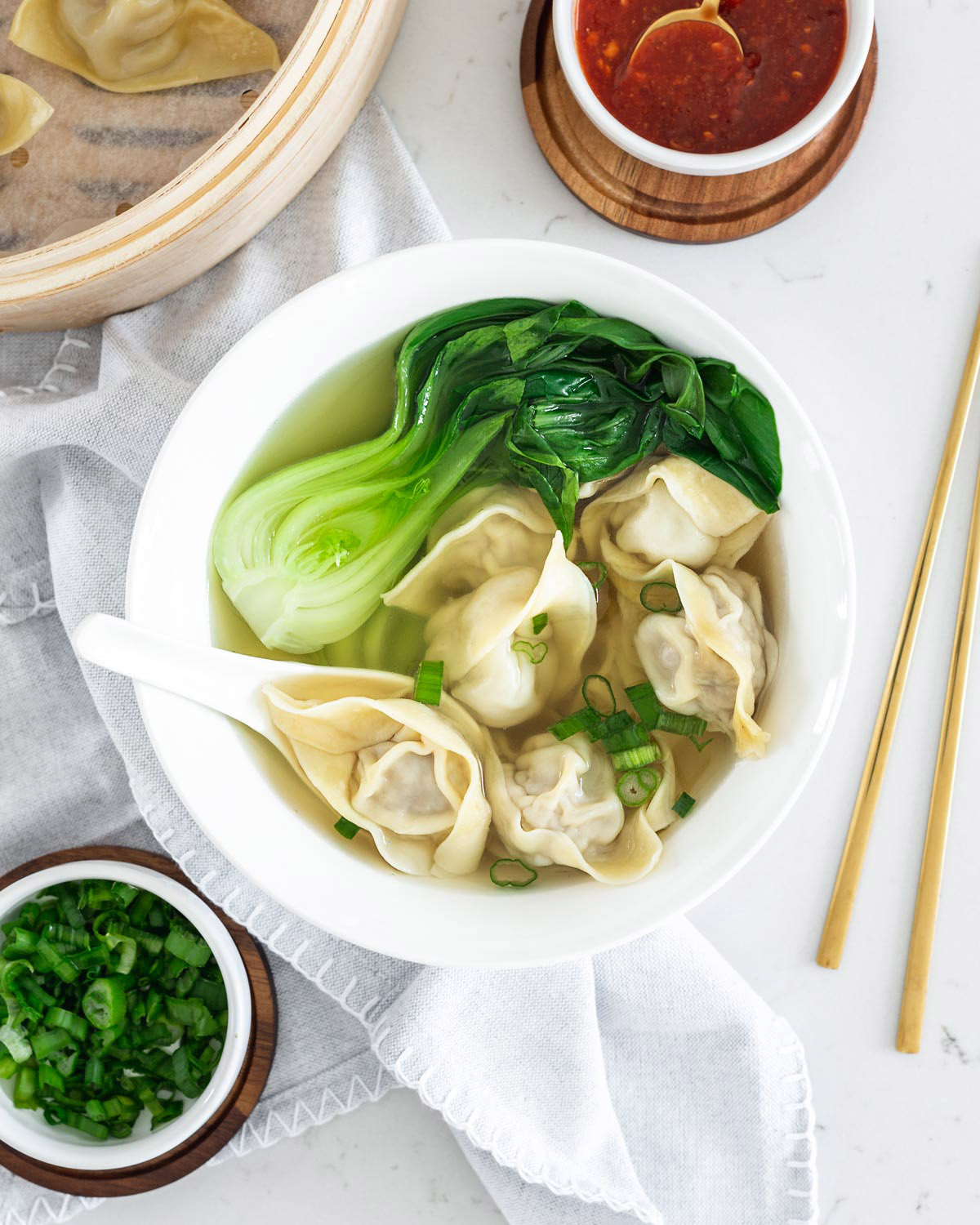 overhead view of wonton soup dinner spread