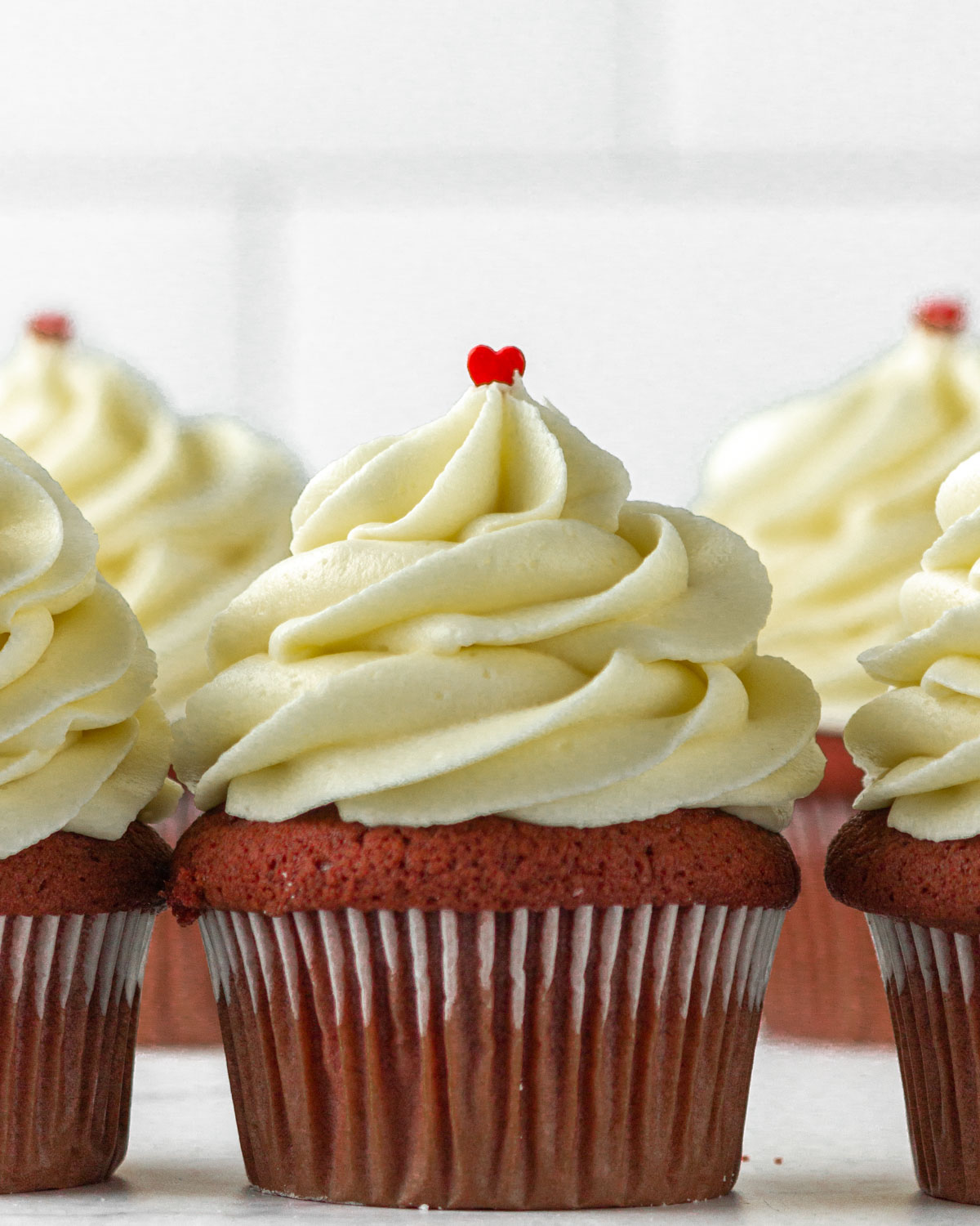 lined up red velvet cupcakes