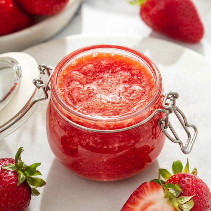 close-up of a jar of strawberry sauce