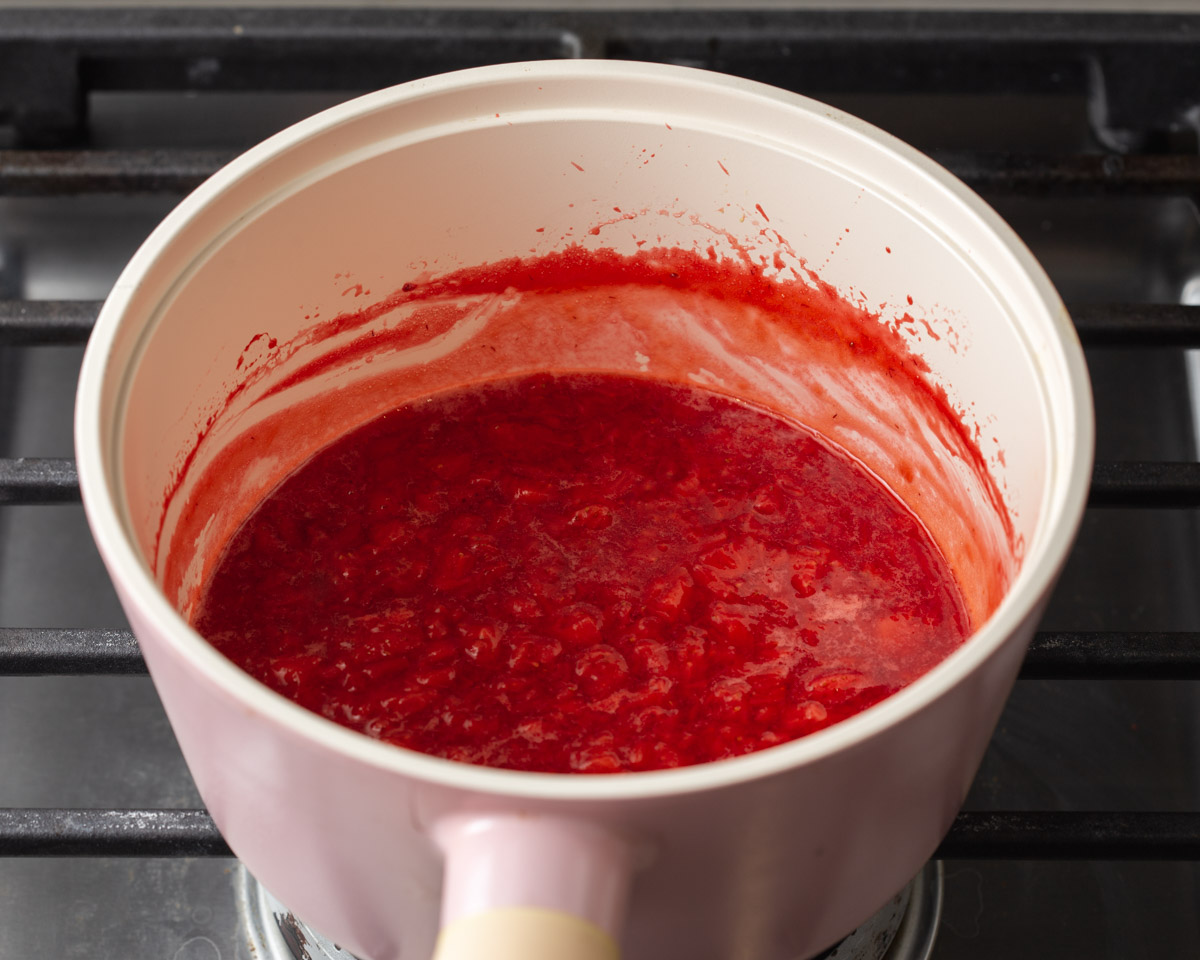 cooked down strawberries in a pot