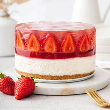 looking straight on at a strawberry jelly cheesecake