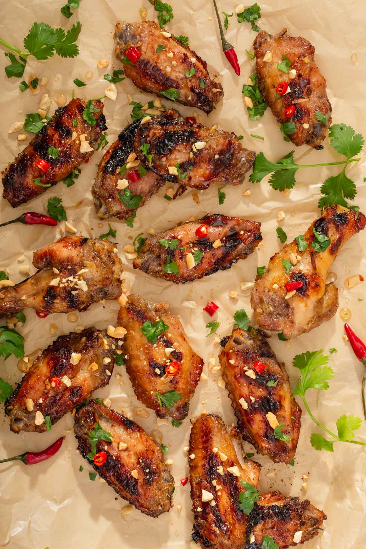 chicken wings lying on parchment paper