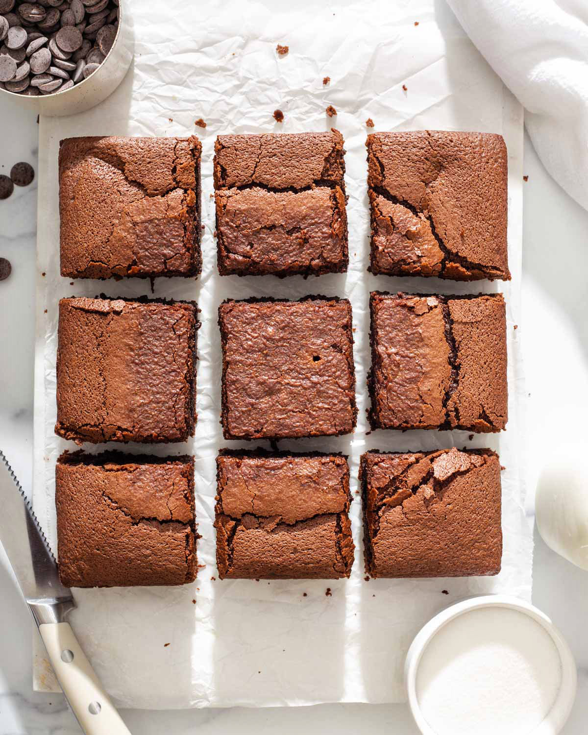 Looking down onto a platter of mochi brownies in a grid