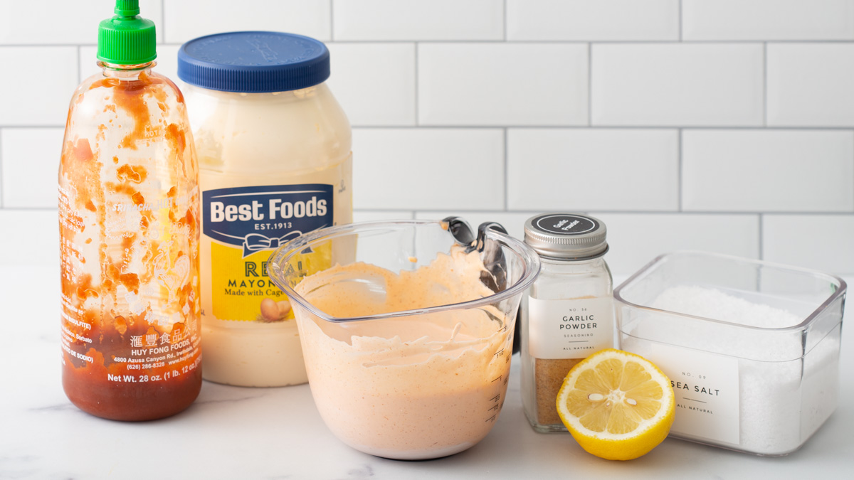 Ingredients for a sriracha mayo on a counter