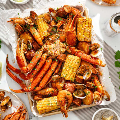 A tray of boiled seafood on a party table spread