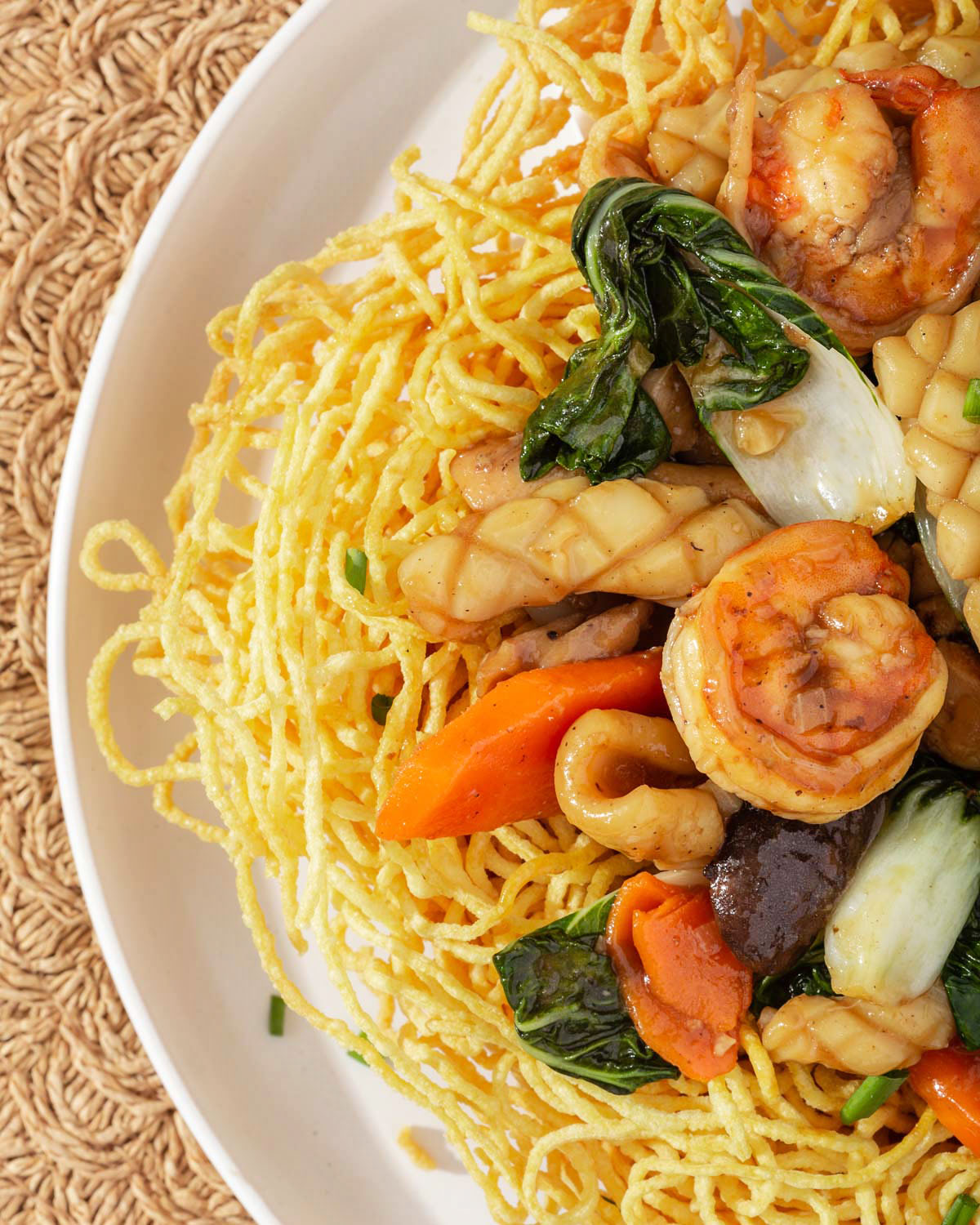 A detail shot of stir fry and fried noodles from above