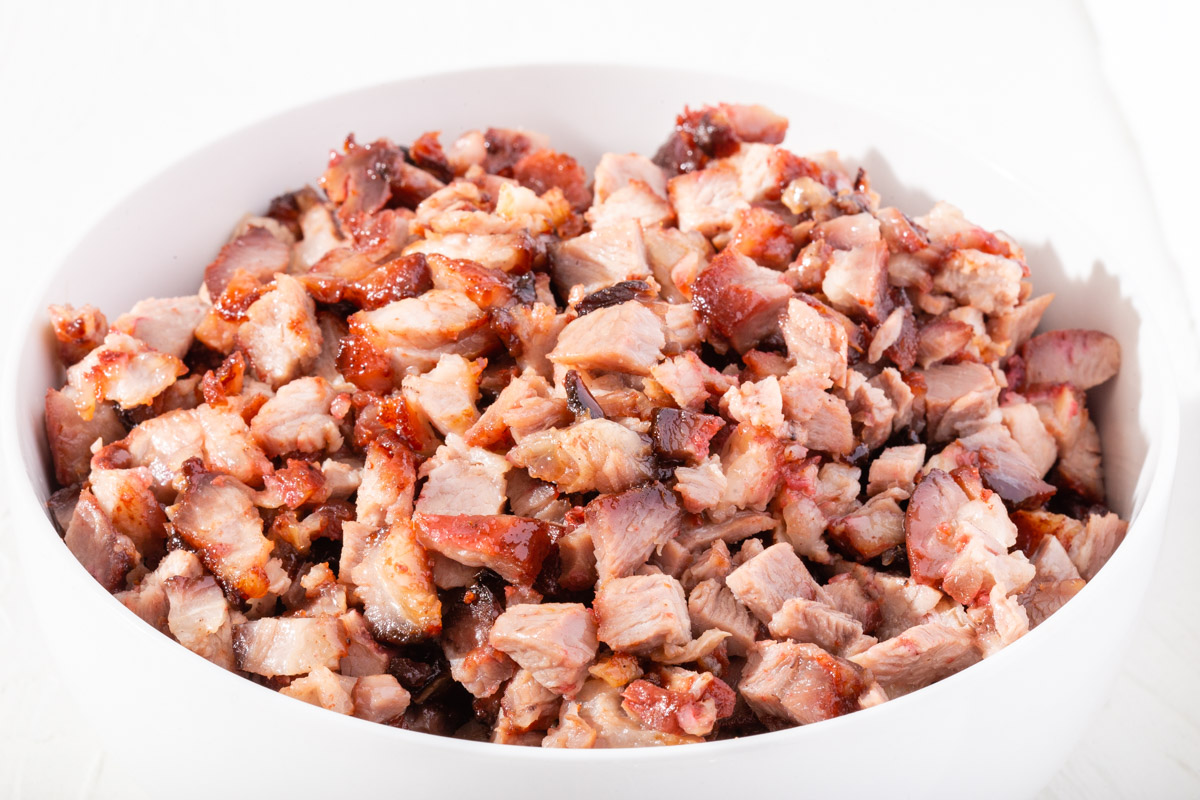 Diced char ciu pork in a bowl.