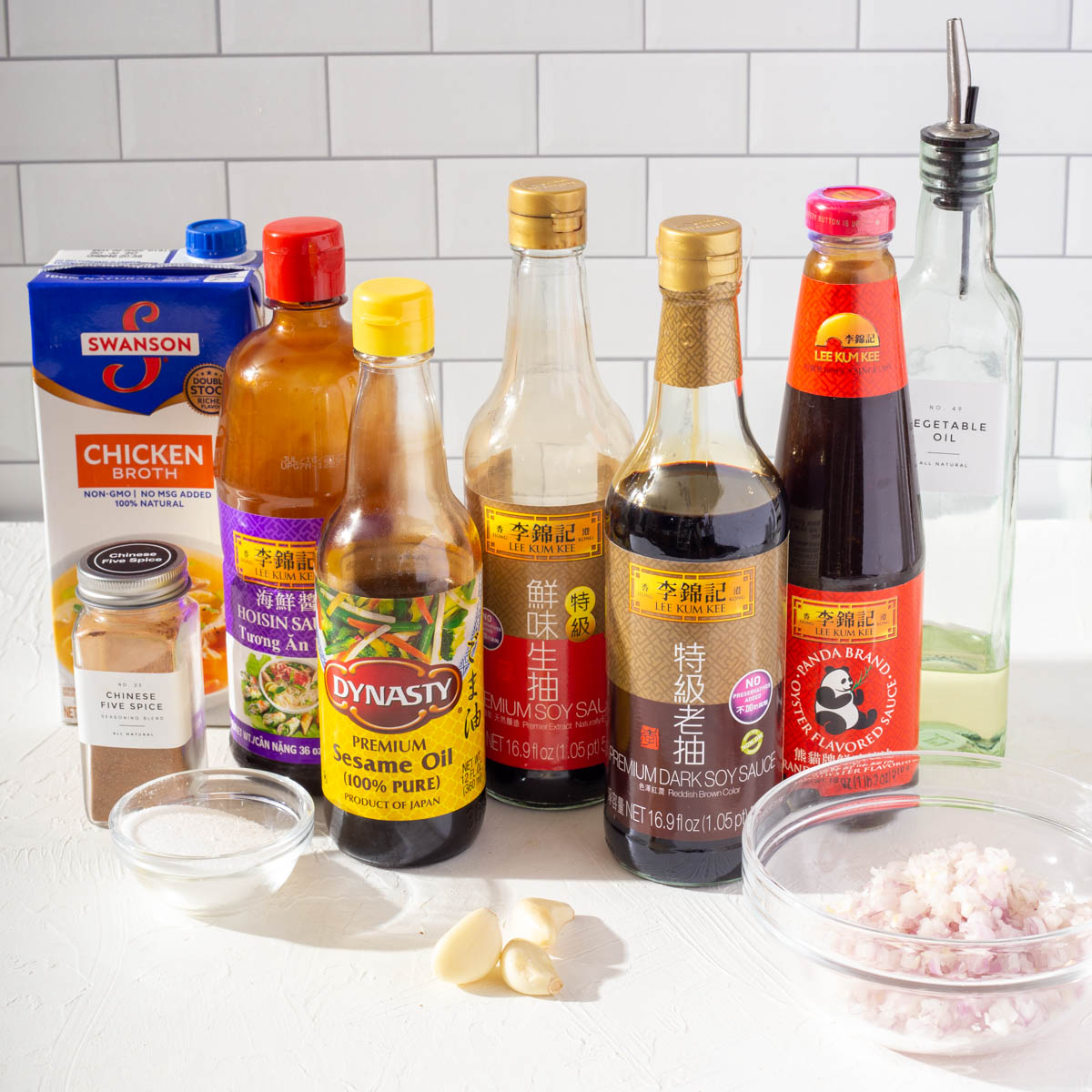 The various sauces and ingredients for char siu pork bun filling on a table.