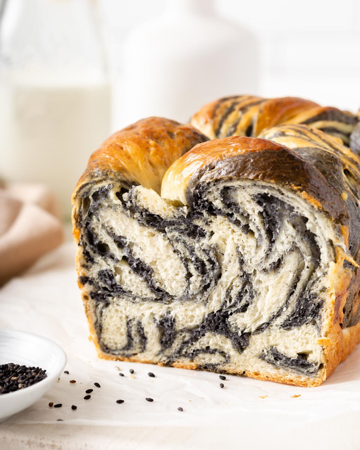 Up close of the inside of marble sesame milk bread.