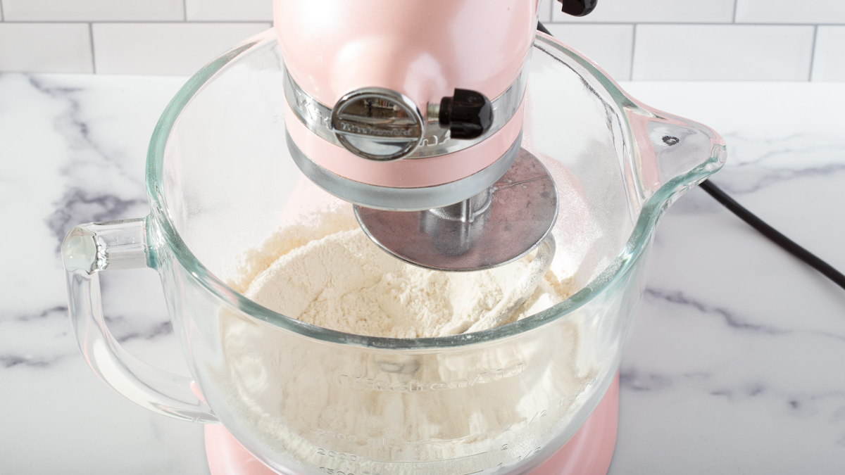 Mixing together the dry ingredients in a stand mixer for milk bread dough.