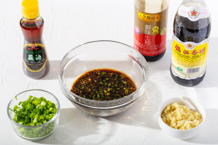 The sauce and ingredients to accompany crispy dumplings