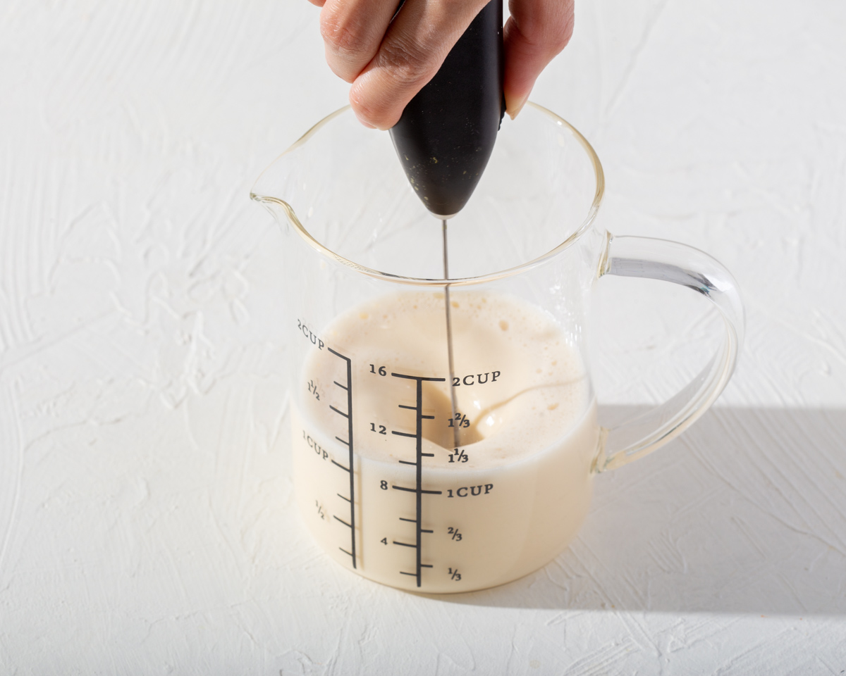 Blending condensed milk creamer with a handheld electric whisk