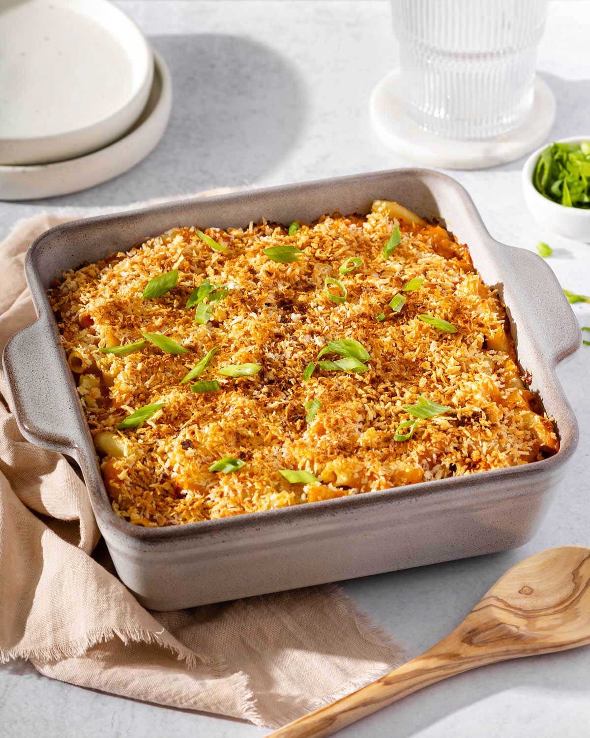 A casserole dish of kimchi mac and cheese ready to serve