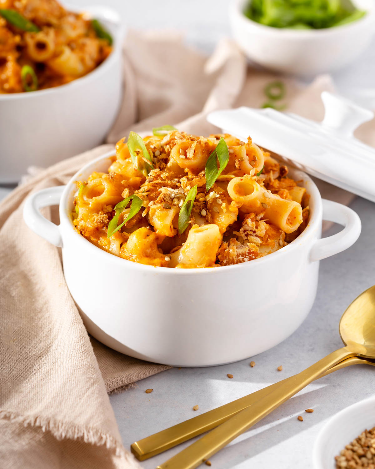 A mini ramekin pot full of kimchi mac and cheese