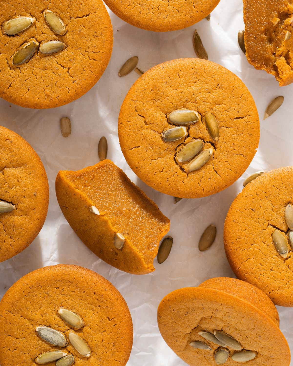 Looking down onto a tray of pumpkin muffins