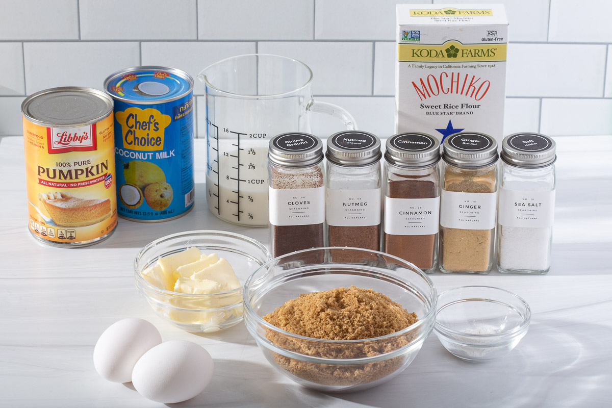 The ingredients for pumpkin mochi muffins on a countertop