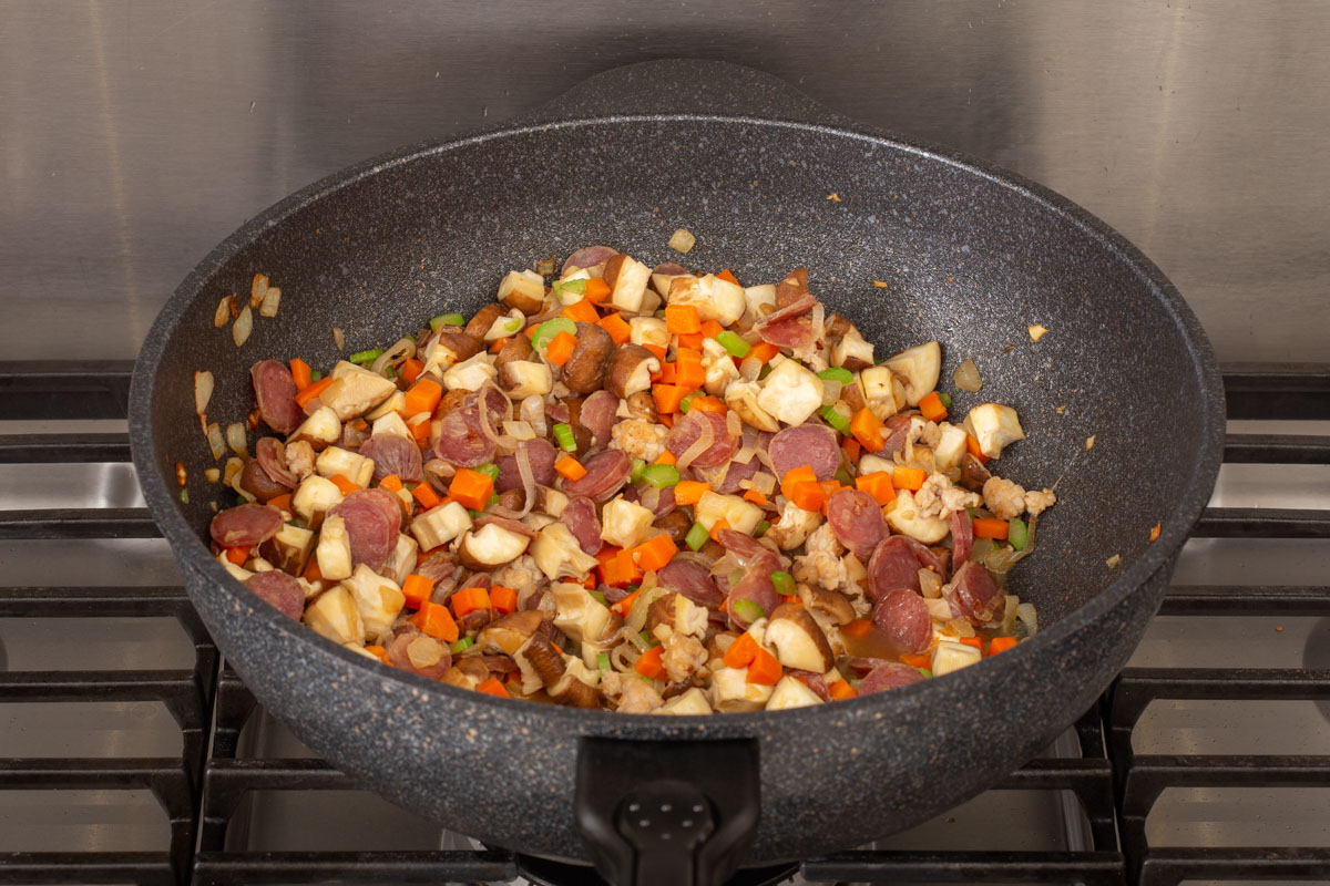 Veggies added into the wok mixture