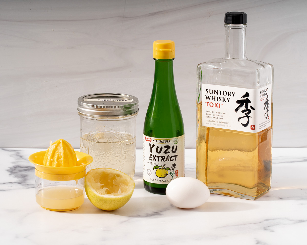 The ingredients for a Japanese yuzu whiskey sour.