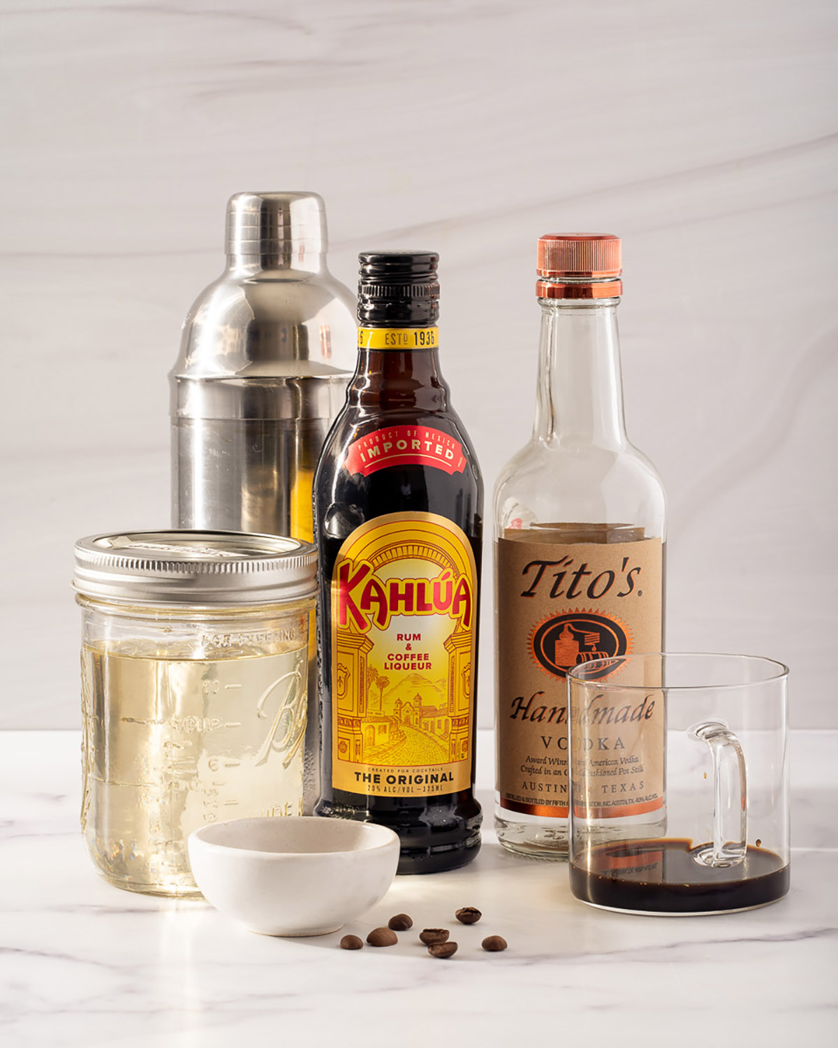 https://takestwoeggs.com/wp-content/uploads/2021/12/The-Best-Espresso-Martini-Takestwoeggs-PROCESS-1-ingredients.jpg