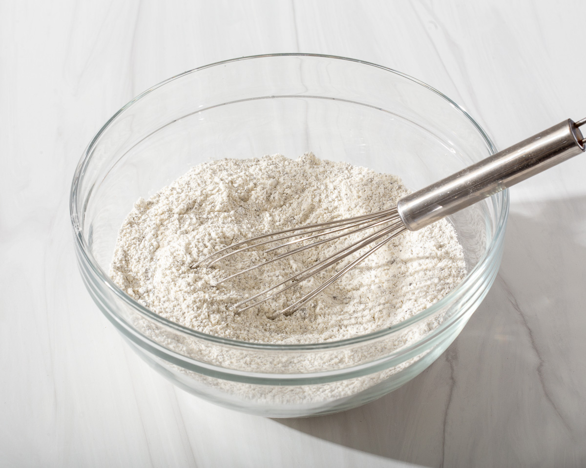 The dry ingredients for waffles whisked together.