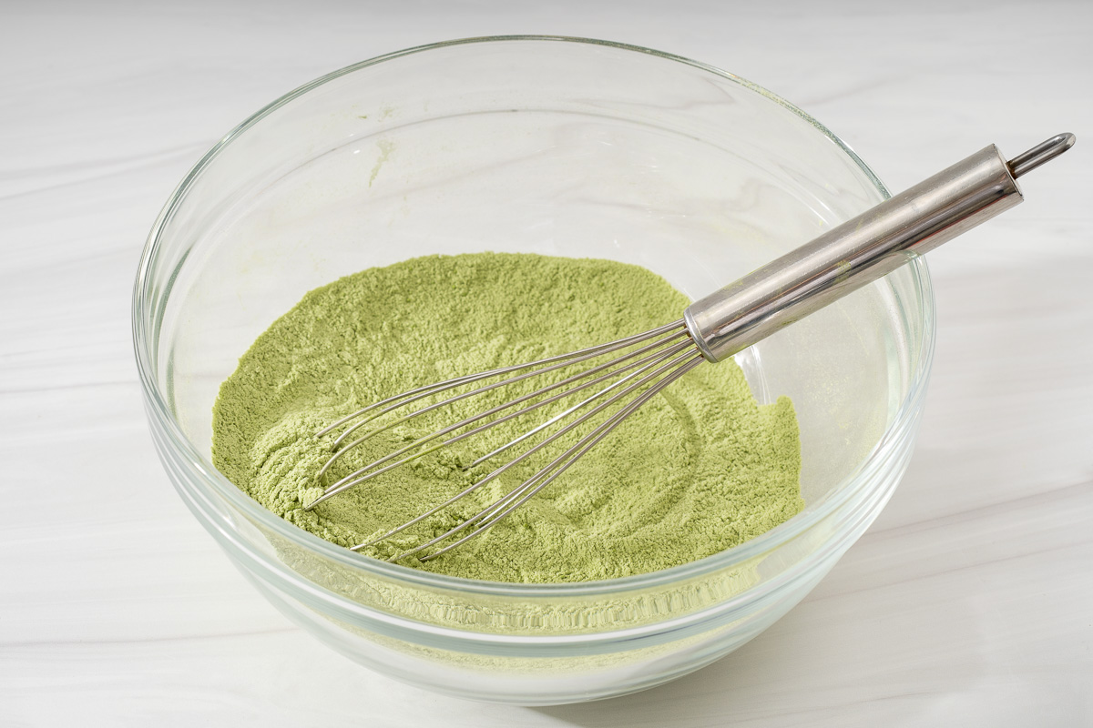 The dry ingredients for matcha brownies whisked together.