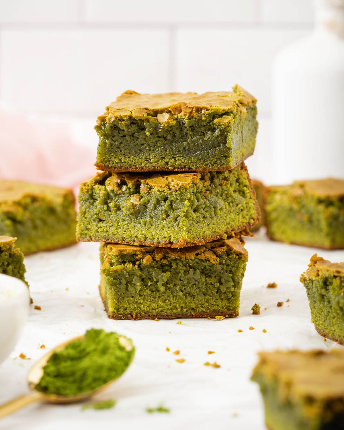 A stack of white chocolate matcha brownies.