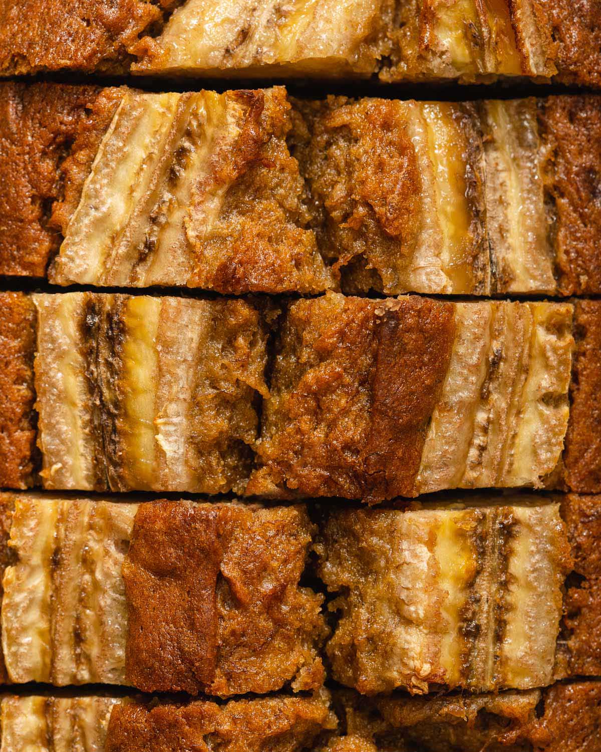 A detail shot of the top of sliced miso banana bread.