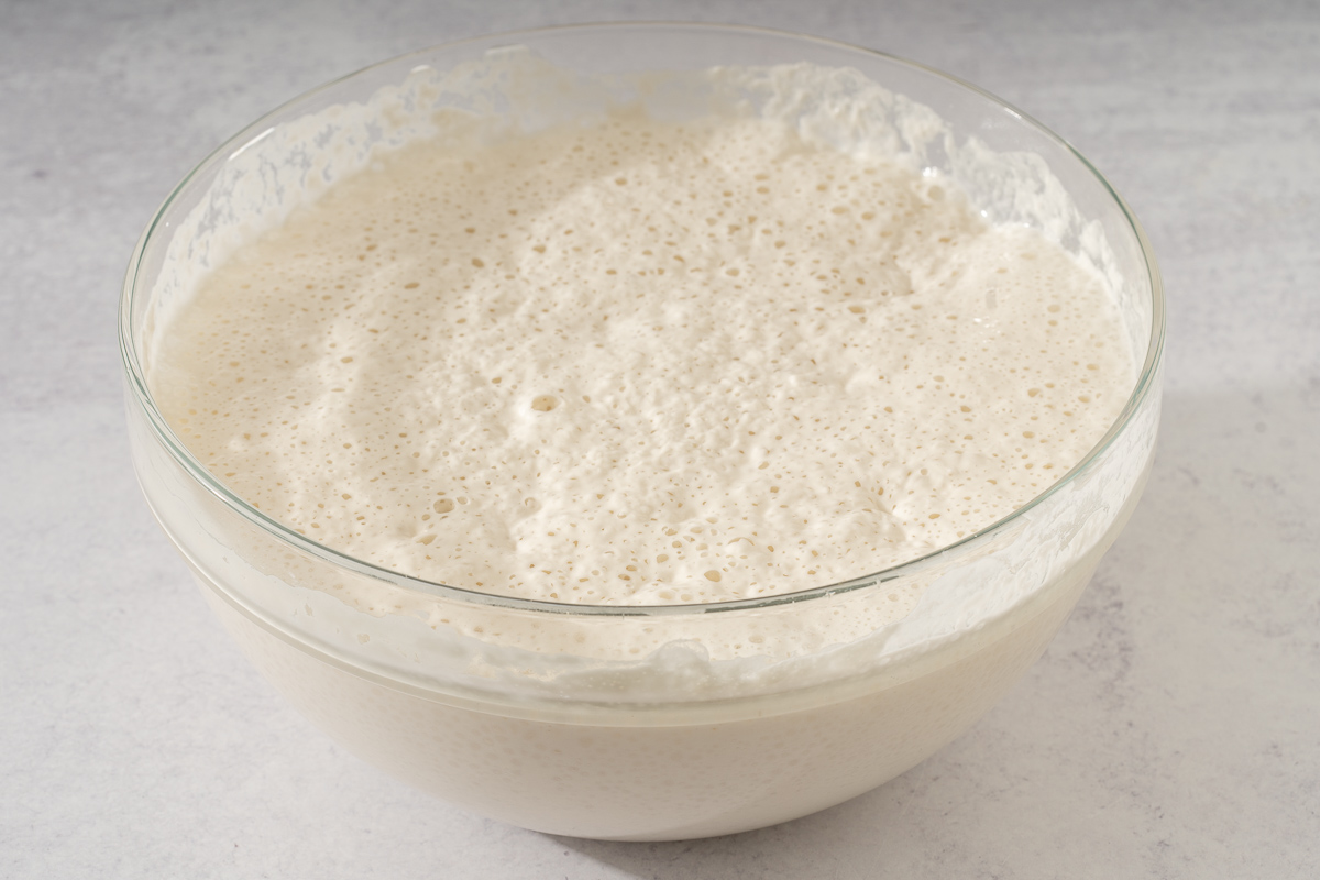 The steamed rice cake dough risen after letting it rest.