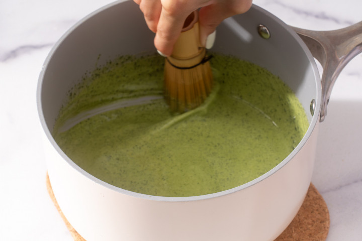Whisking the matcha into the heavy cream.