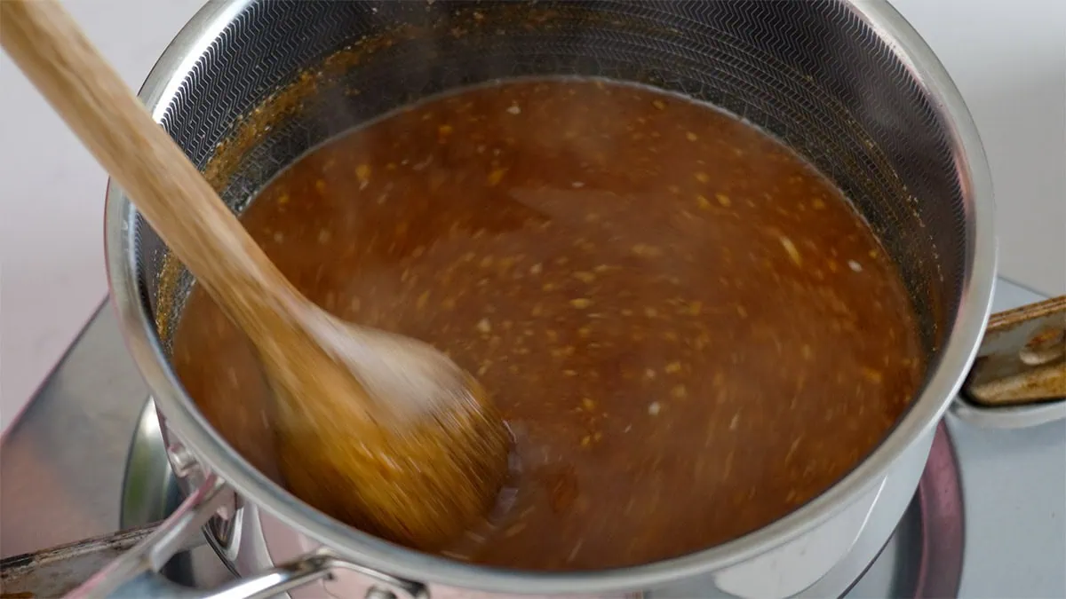 Mixing the peanut sauce ingredients.