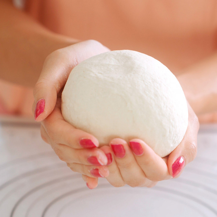 A ball of kneaded dough ready to rest.
