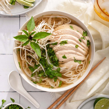 Lookig down at a bowl of Vietnamese chicken pho.