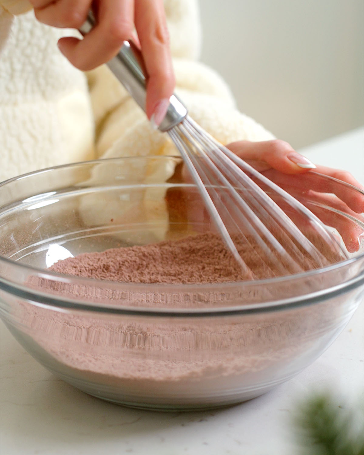 Whisking together the dry ingredients for fudgy peppermint brownie cookies.