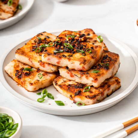 Up close with a plate of Chinese turnip cakes.