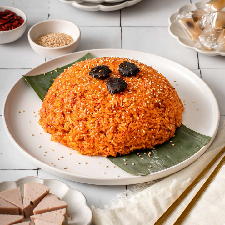 Up close with a plate of Vietnamese red sticky rice.