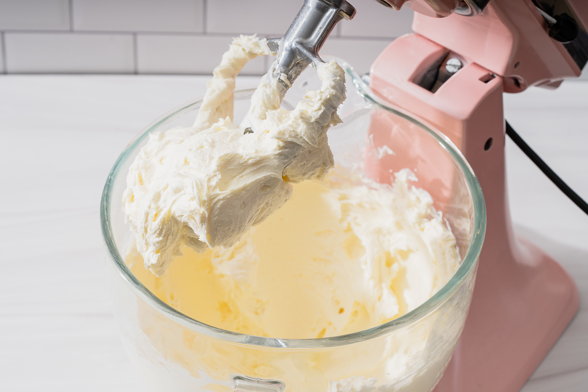 Cream cheese after being creamed in a stand mixer.