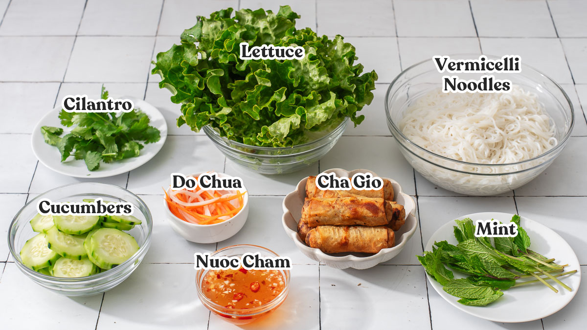 All the ingredients to make bun cha gio organized and labeled.