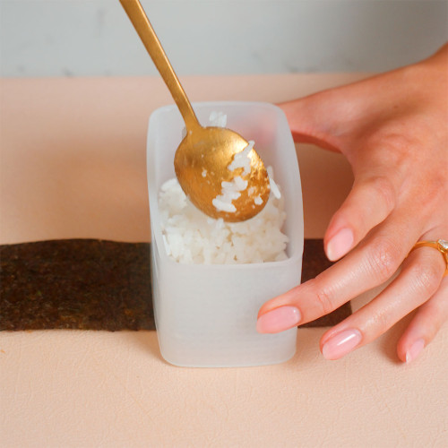 Using A Musubi Mold Spam Musubi with Egg – Takes Two Eggs