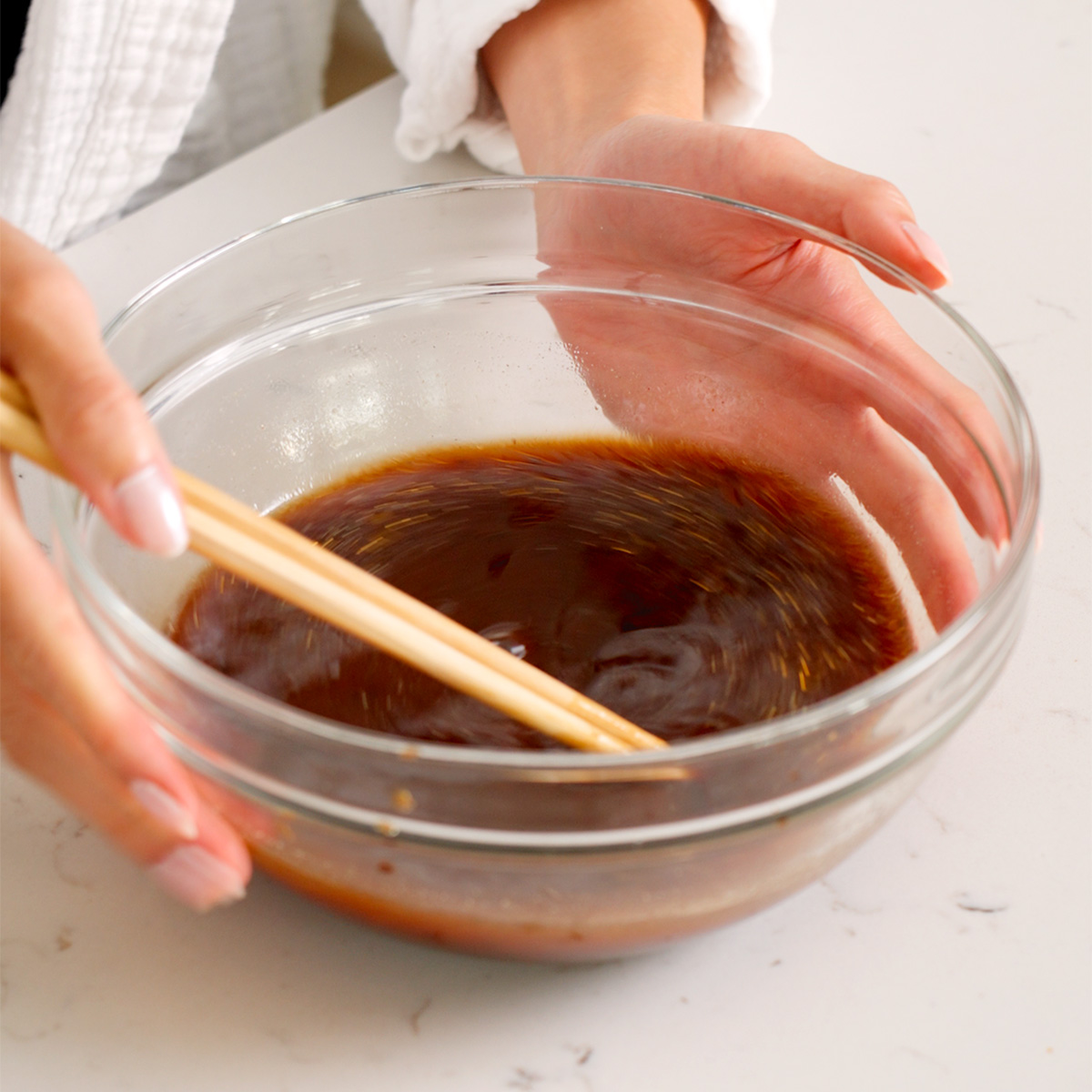 Black bean sauce mixed together in a glass mixing bowl.