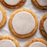 Looking down at a grid of Chai sugar cookies on parchment paper.