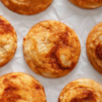 Looking down at a grid of gochujang cookies on parchment paper.