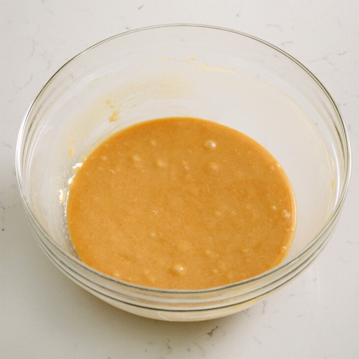 Sesame cookie dough in a mixing bowl ready to chill.