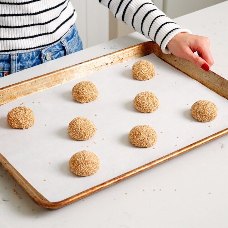 A tray of sesame cookies ready to be baked.