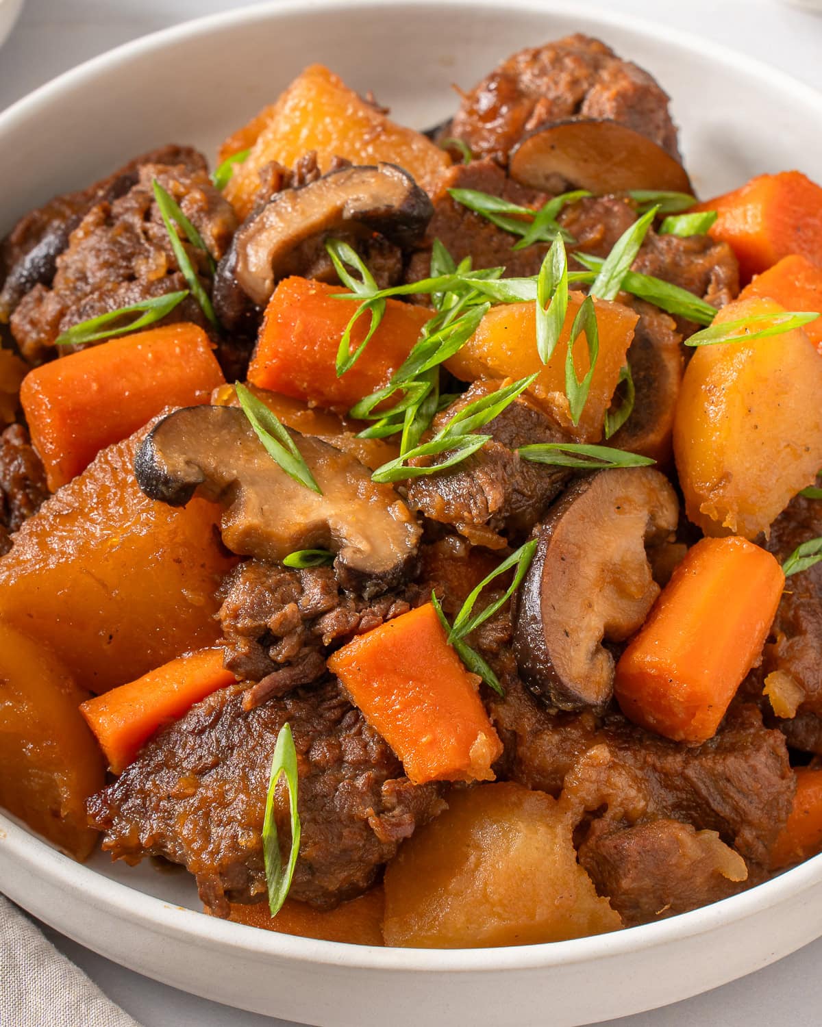 A detail shot of a plate of galbi jjim.