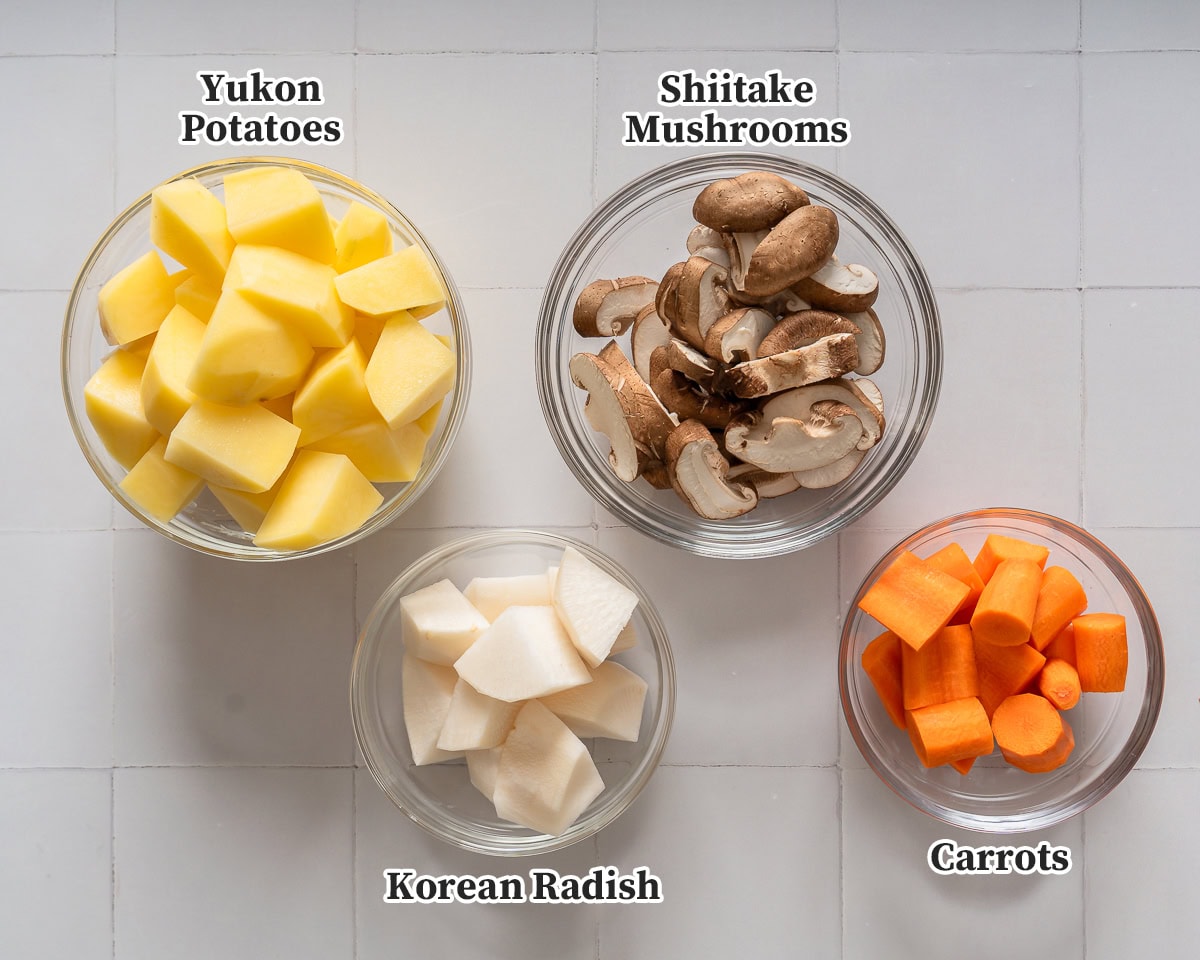 All the vegetables for making galbi jjim organized and labeled.