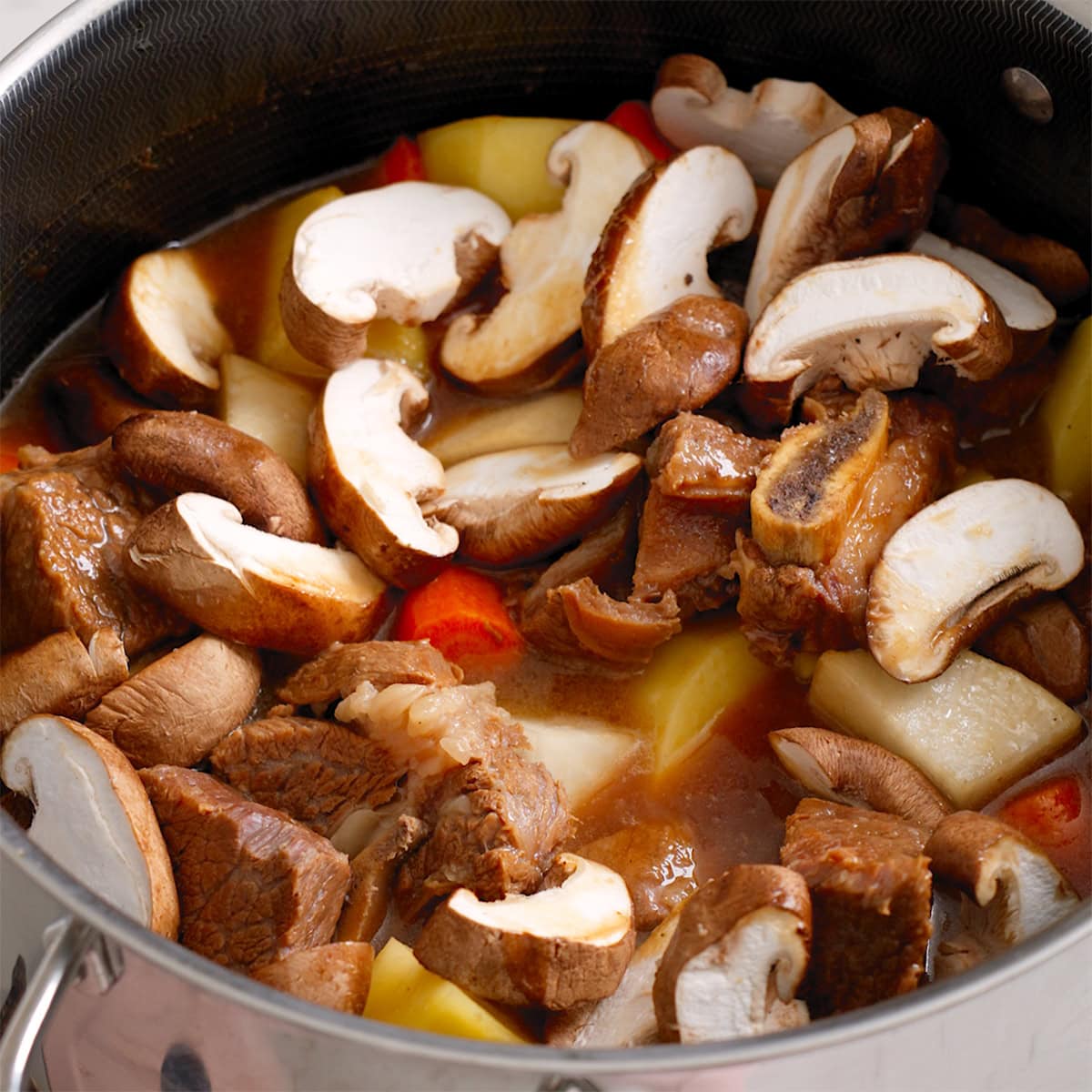 A pot of galbi jjim before cooking down.