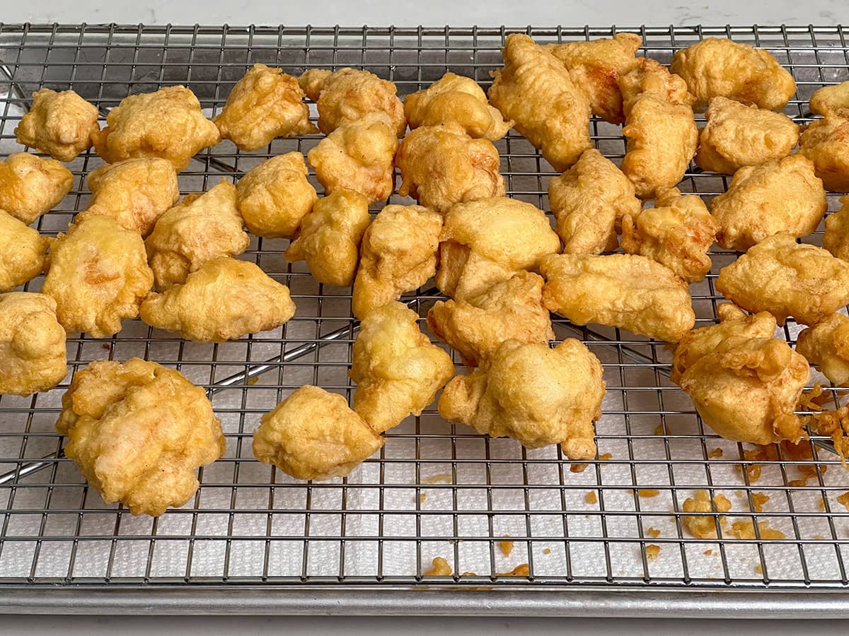 The chicken breast after the first fry.