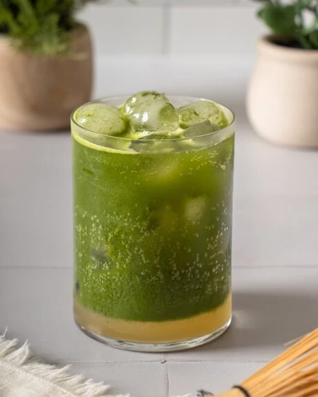 A glass of yuzu matcha tonic.