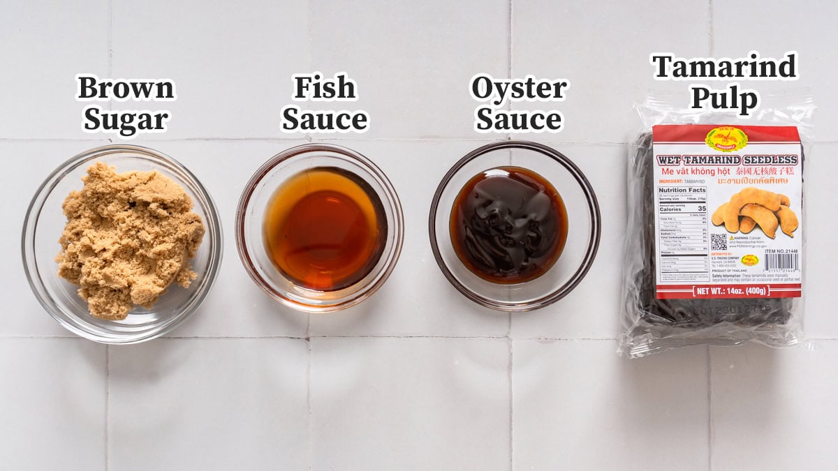 All the ingredients for pad thai sauce organized and labeled.