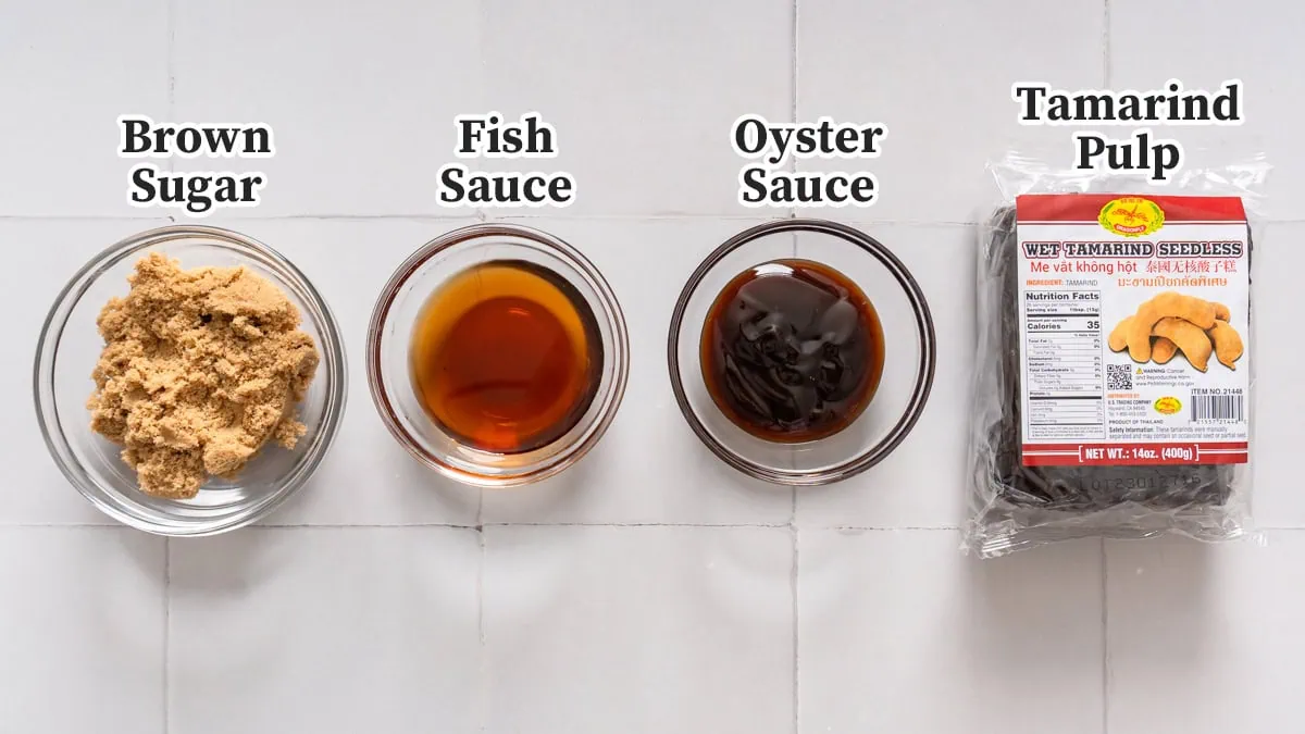 All the ingredients for pad thai sauce organized and labeled.